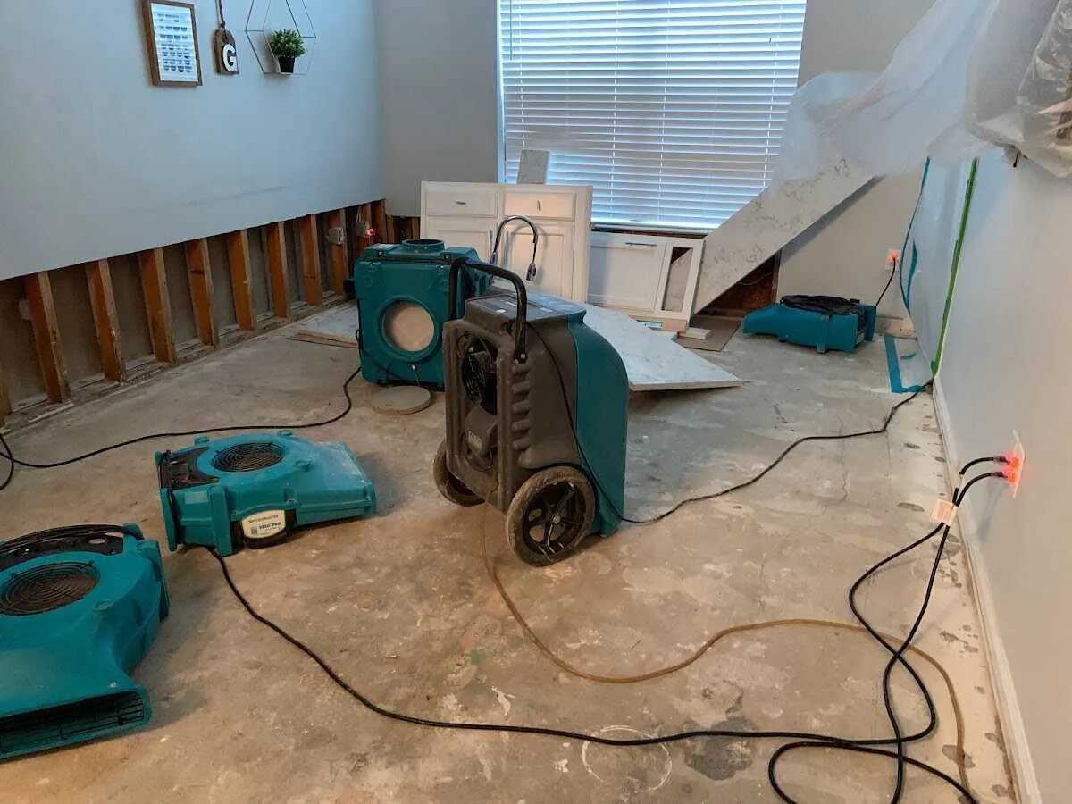 Dehumidifier in flood-cut room for Water Damage Restoration in Immokalee